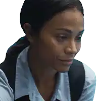 a close up of a woman 's face with a white shirt and black vest
