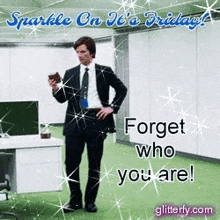 a man in a suit and tie is standing in an office holding a coffee cup .
