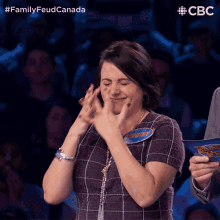 a woman with a name tag that says dorothy applauds
