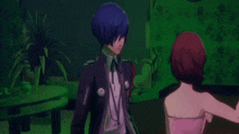 a man and a woman are standing next to each other in a green room
