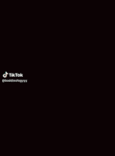 a woman with green hair is smoking a cigarette in a tiktok video