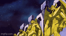 a group of gold statues standing next to each other with a blue sky in the background