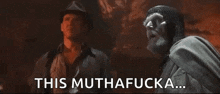 a black and white photo of two men standing next to each other with the words `` this muthafucka '' written on the bottom .