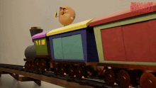 a cartoon train with the word sausage party written on the bottom