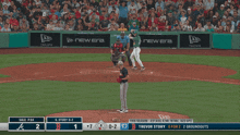 a baseball game is being played between the atlanta braves and the san francisco giants