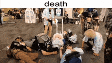 a group of people are laying on the floor with the word death written above them