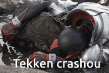 a person in a tekken crashou costume is laying on a rock in the water