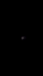 a dark background with a circle in the middle