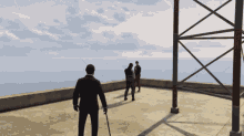 a man with a cane stands on a rooftop with two other men