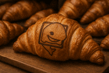 a croissant with a picture of a sandwich on it