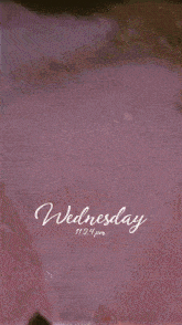 a car is parked on a street on wednesday at 11:24 pm