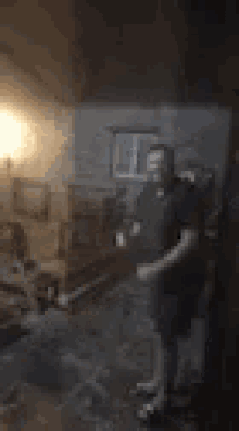 a blurry photo of a man standing in a room
