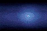 a glowing star with purple and blue rays coming out of it on a dark blue background