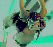 a close up of a cartoon character with horns