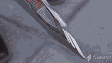 a close up of a red object that says icecream