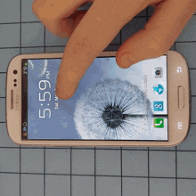 a samsung phone displays the time as 5:59