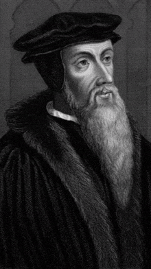 a black and white portrait of a man with a beard wearing a fur coat .