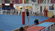 Gymnast Backflip GIF - Gymnast Backflip Gymnastics GIFs