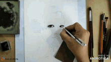 a person is drawing a woman 's face with a pen on a piece of paper made in animatica