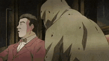 a man in a suit and bow tie is standing next to a monster in a cartoon .