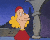 a cartoon character with blonde hair and a red hat is smiling