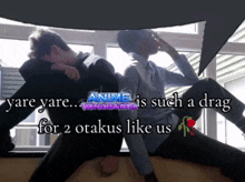 two men are sitting next to each other in front of a window and the words anime vanguards are above them