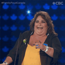 a woman wearing a name tag that says sonya is laughing