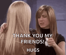two women are hugging each other and saying `` thank you my friends ! hugs '' .