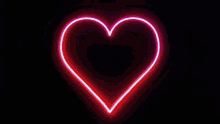 a neon sign that looks like a broken heart with a lightning bolt in the middle