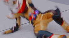 a person in a superhero costume laying on the ground
