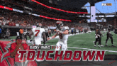 an advertisement for bucky irving 's touchdown with a football game in the background