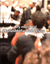a blurred image of a crowd with the caption " cry more kid "