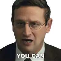 a man with glasses and a suit says " you can "