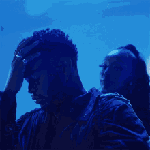 Holding My Head Nonso Amadi GIF - Holding My Head Nonso Amadi Foreigner Song GIFs