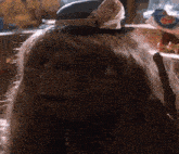 a close up of a person wearing a hat
