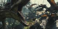 a dinosaur with its mouth open surrounded by trees