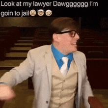 a man in a suit and tie with a caption that says look at my lawyer