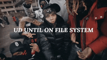 a group of people with the words ud until on file system on the top
