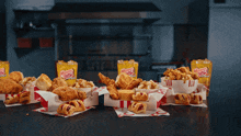 a bunch of fried food with a bag of mrs. deb on it