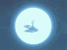 a plane is flying through a bright blue circle in the sky .
