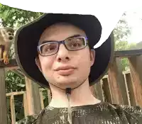 a man wearing a hat and glasses stands in front of a monkey