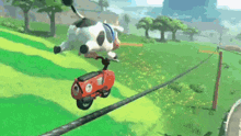 a cartoon character is riding a motorcycle down a road in a video game .