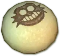 a close up of a cookie with a face on it