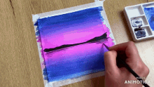 a person is painting a purple and blue landscape with the words made in animatica visible in the corner