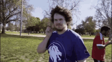 Guy With Curly Hair Walking GIF - Guy With Curly Hair Walking Thumbs Up GIFs