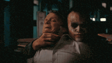 a person wearing blue gloves is touching a stomach