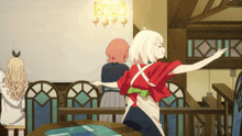 a girl in a red shirt with a green bow on her back stands in a room