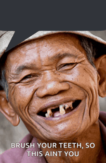 a man with a hat on smiles with the words brush your teeth so this aint you