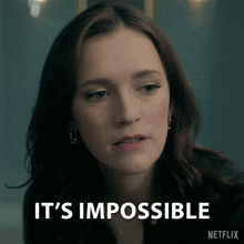 a woman says it 's impossible with a netflix logo behind her