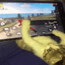 a person is playing a game on a tablet